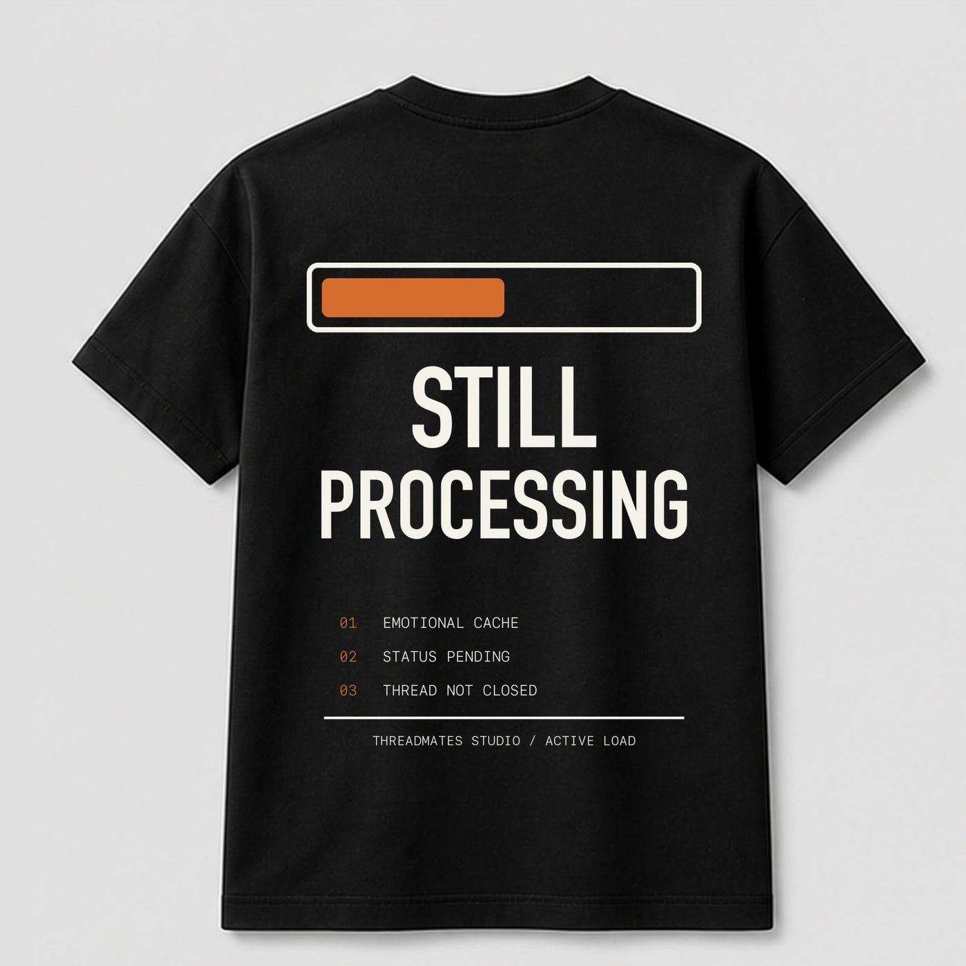 Still Processing graphic tee by Threadmates featuring original internet culture artwork on black t-shirt, back.