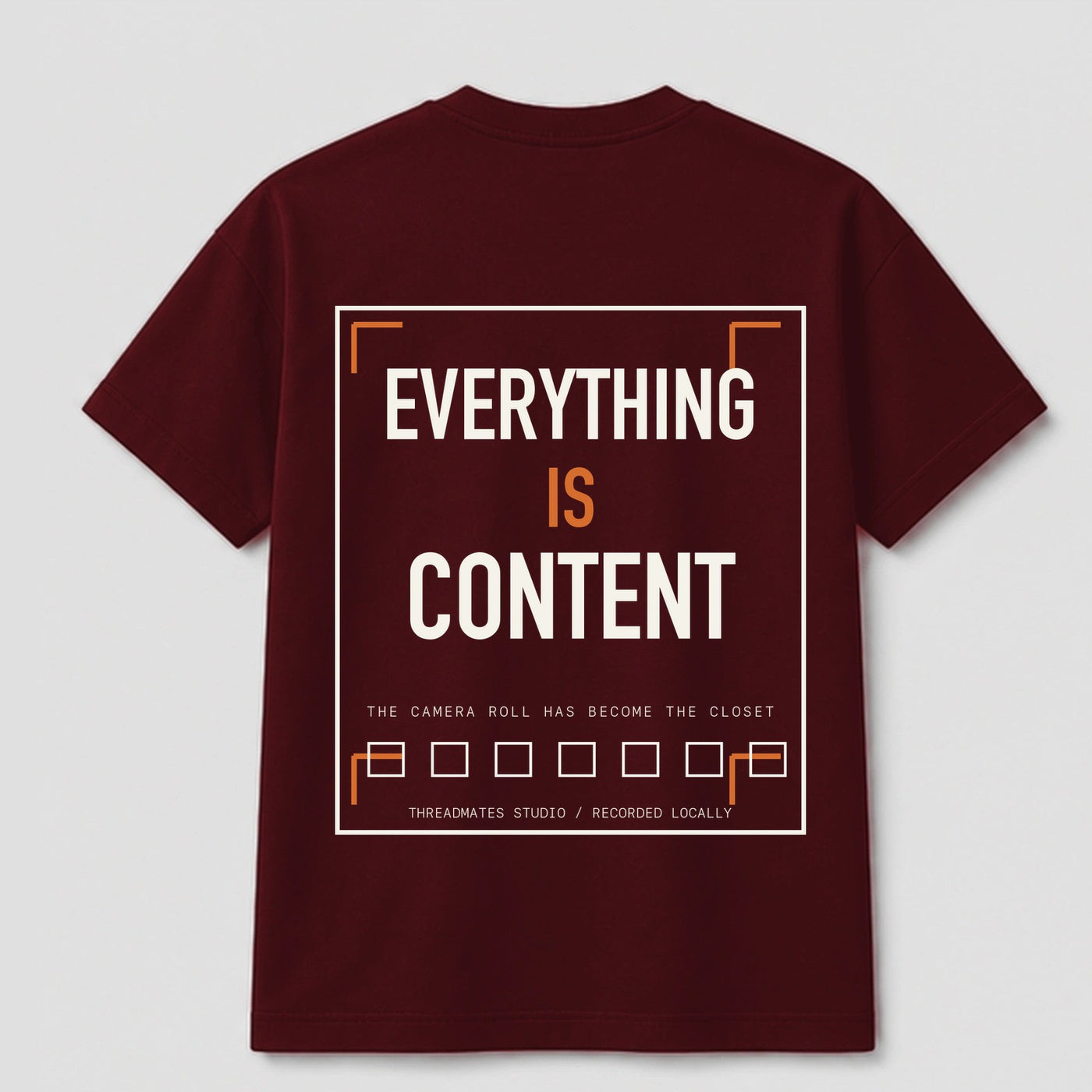 Everything Is Content graphic tee by Threadmates featuring original creator culture artwork on maroon t-shirt, back.