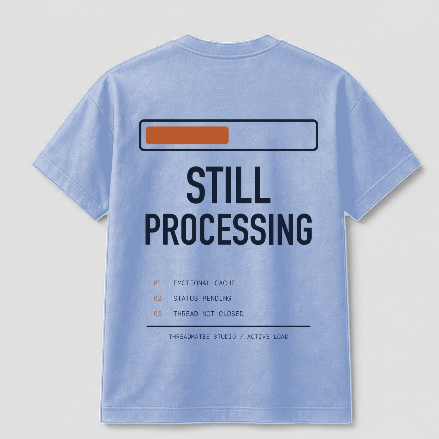 Still Processing graphic tee by Threadmates featuring original internet culture artwork on light blue t-shirt, back.